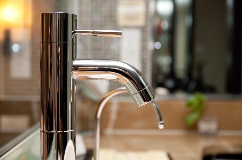 Leaking tap being repaired in Hackney